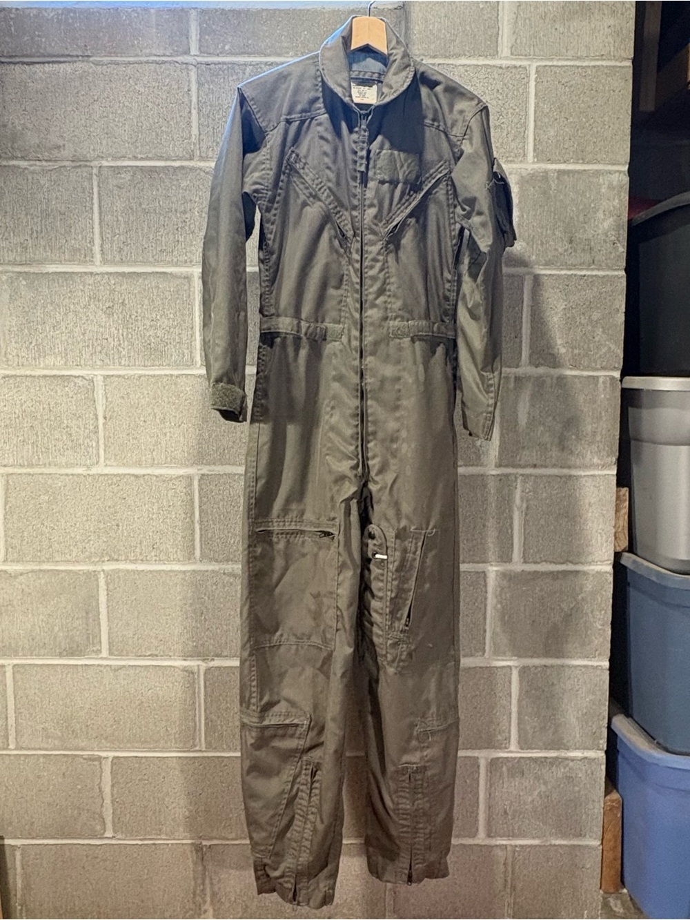 Military green flight suit coveralls.